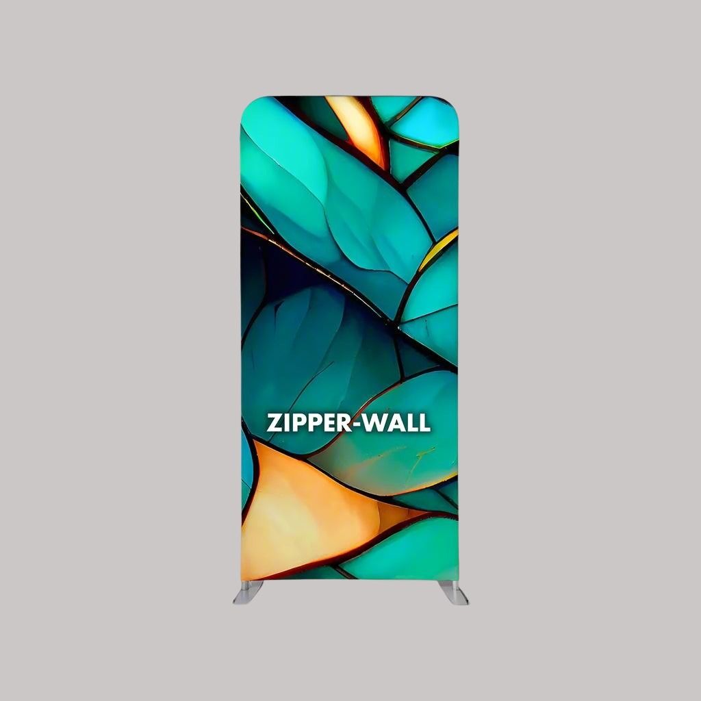 A 1m wide fabric backdrop display stand with a geometric pattern featuring shades of blue and orange, and the text 'ZIPPER-WALL' printed on it.