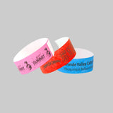 Custom printed Tyvek paper event wristbands with black logos and text