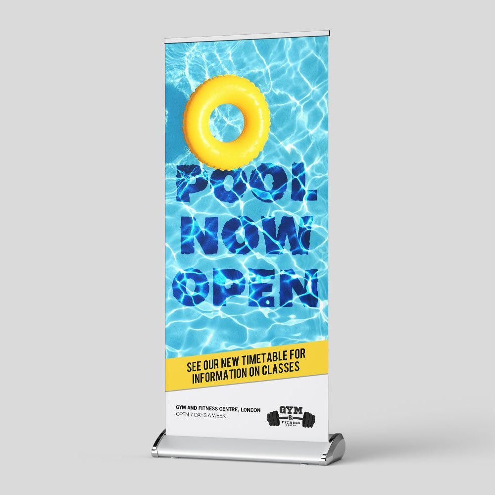 Full colour printed pull up banner featuring bright yellow flower artwork on a portable retractable stand