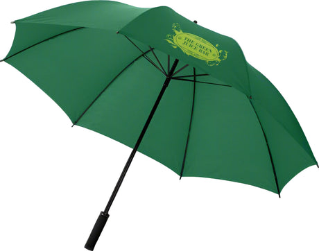Golf umbrella with vibrant branded panels at outdoor event