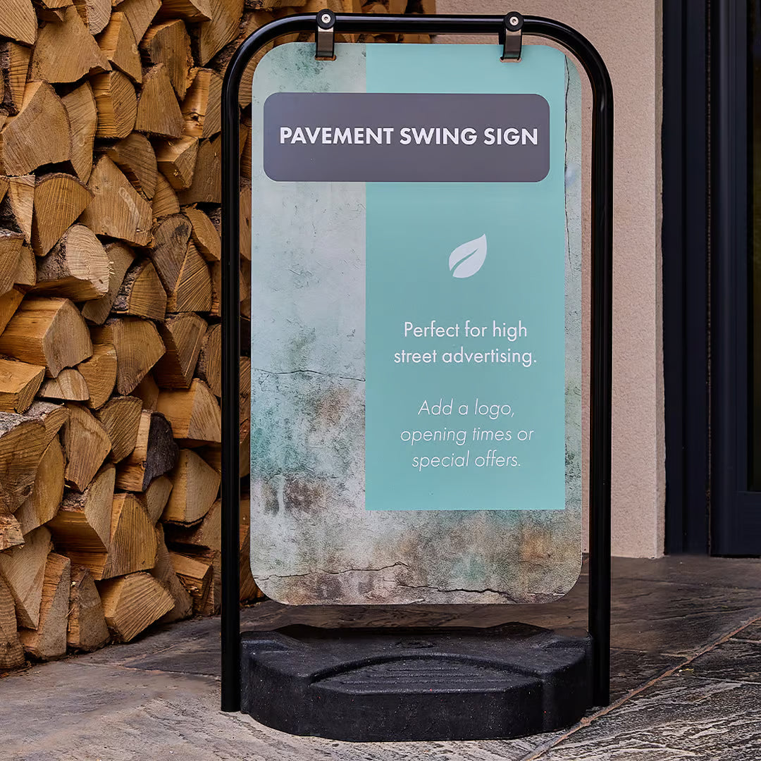 Premium pavement swing sign outside retail shop in Ireland promoting business branding and footfall attraction