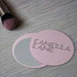 Promotional makeup mirror with sliding design