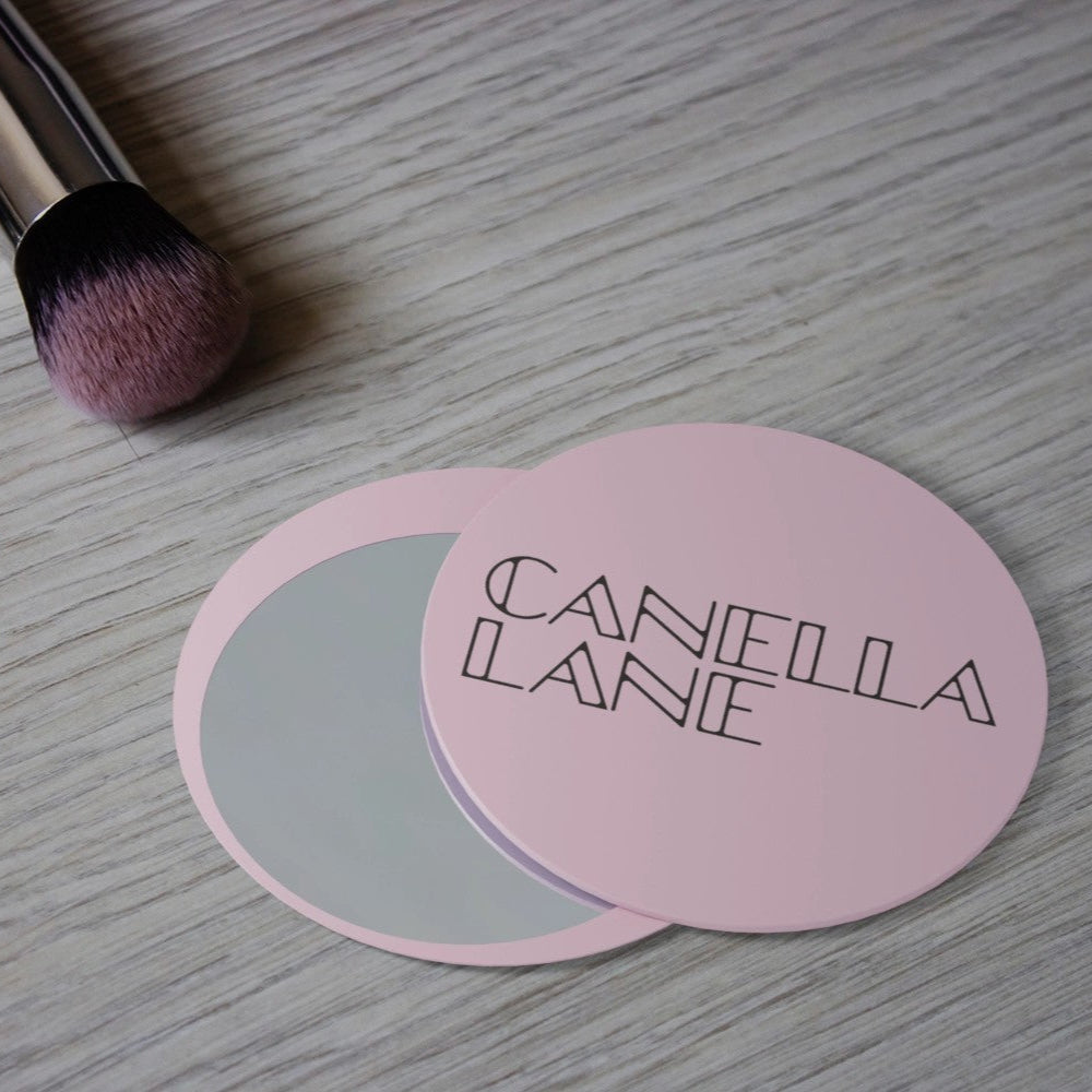 Promotional makeup mirror with sliding design