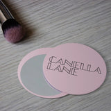 Promotional makeup mirror with sliding design
